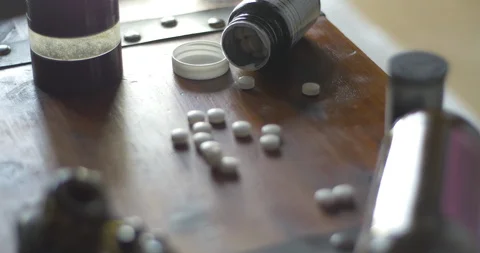 Hand Grabs for Drugs, Shallow Depth of Field, Stock Footage 106575736