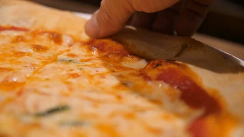 Hand Grabs Pizza Slice Stock Footage 100572055