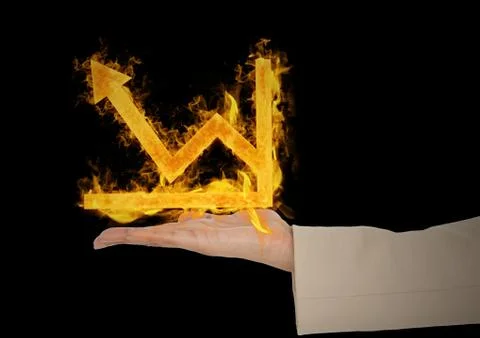 Hand with graph fire icon over. Black background Stock Photos