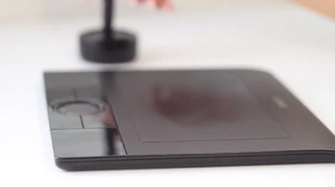 Hand on graphic tablet Stock Footage 1087464