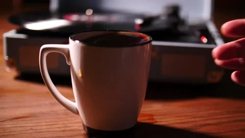 Hand grasping a very full mug of hot coffee Stock Footage 153666793