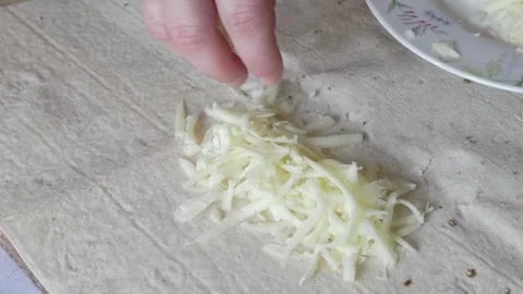Hand Grating Ingredients for Culinary Preparation to Enhance Flavor and Texture Видео 280959551