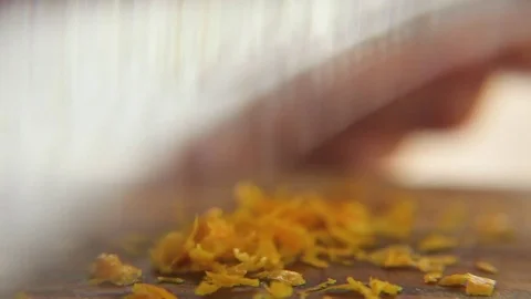 Hand grating orange peel with grater Video stock 76099478