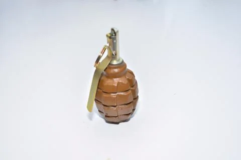 The hand grenade on a white background close-up Fotos de archivo