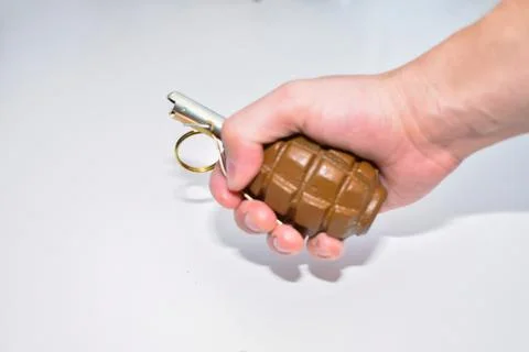 The hand grenade on a white background close-up 스톡 사진