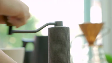 Hand grinding coffee bean Stock Footage 148196798