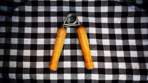 Hand grip exercises for forearm development with black and white combination Stock Photos