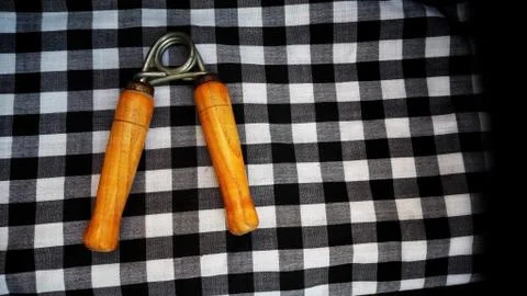 Hand grip exercises for forearm development with black and white combination Stock Photos