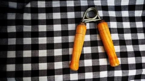 Hand grip exercises for forearm development with black and white combination Stock Photos