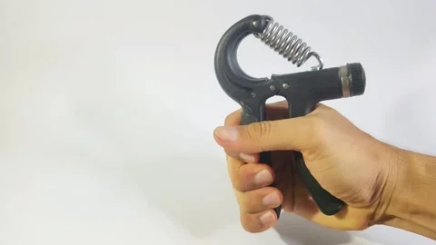 Hand grip tool for arm muscle training Stock Footage 303078477