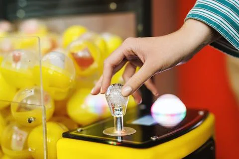 Hand Gripping Arcade Machine Control Knob Stock Photos