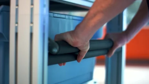 Hand gripping padded handle bar on gym equipment, Close Up Shot Vídeo Stock 342285777