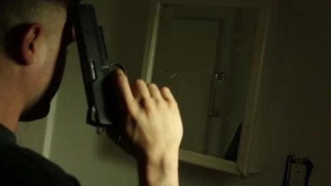 Hand Gun contemplation Video stock 113076217