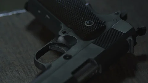 Hand with a gun 스톡 동영상 112130125