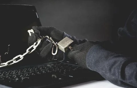 Hand of hacker unlock computer. Dangerous hacker stealing data security and r Foto stock