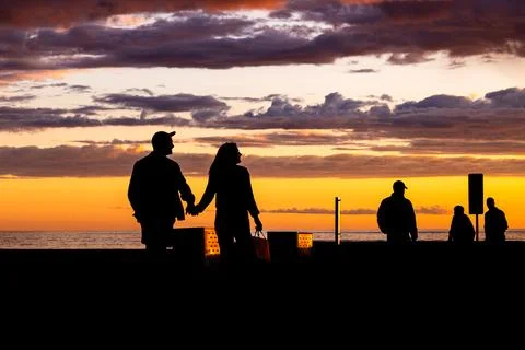 Hand in Hand at Dusk Stock Photos