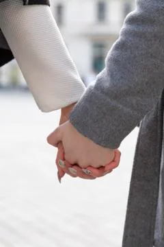 Hand in hand Stock Photos