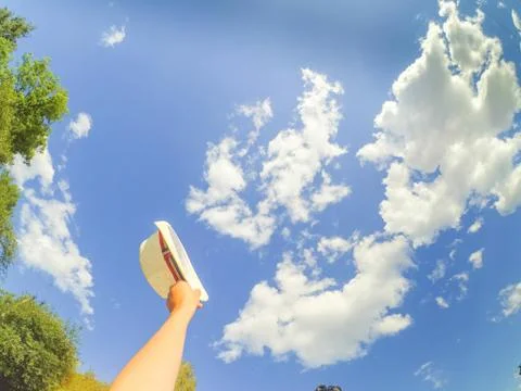 Hand hat sky cloud summer Foto stock