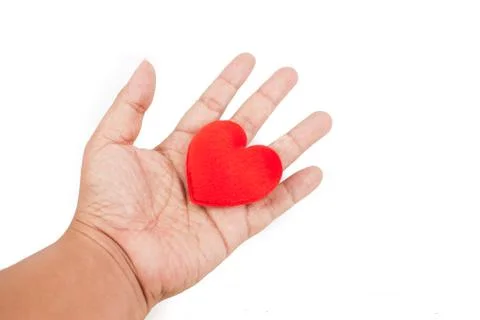 Hand with heart Stock Photos