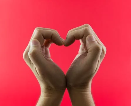 Hand in heart shape Stock Photos