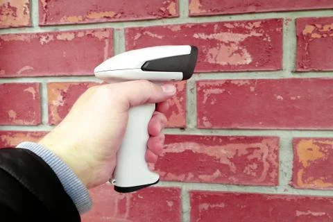 Hand Held Barcode Scanner on man hand White, Isolate on white background. 스톡 사진