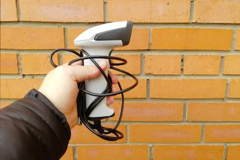 Hand Held Barcode Scanner on man hand White, Isolate on white background. Foto stock