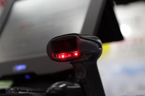 A hand held barcode scanner Stock Photos