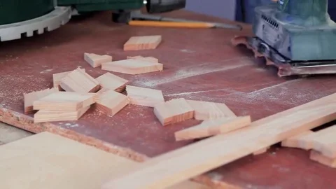 Hand-held belt sander at finished wood furniture Stock Footage 69205455
