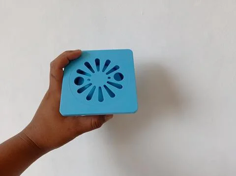 Hand held blue plastic sewer filter. floor drain Stock Photos