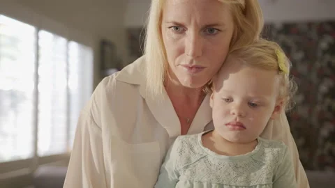 Hand Held Closeup of Working Mom Answering Emails with Baby Daughter Stock Footage 133287774