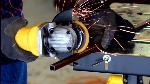 Hand Held Grinder Cutting Metal with Sound Stock Footage 41691728
