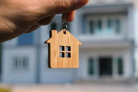 Hand-held key chain image The back has a sample house. Stock-Fotos