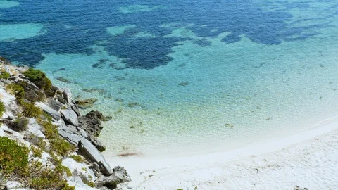 Hand held Pan down to beach, Slow motion. Rottnest Island. Perth. WA Tourism. Stock Footage 125284477