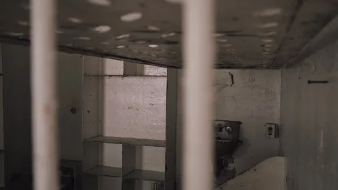 Hand Held Prisoners Jail Cell Stock Footage 107697641