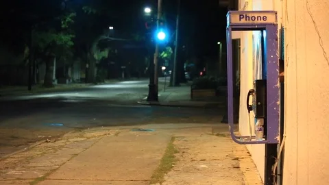 Hand held shot of a desolate street at night time in America Stock Footage 72715696