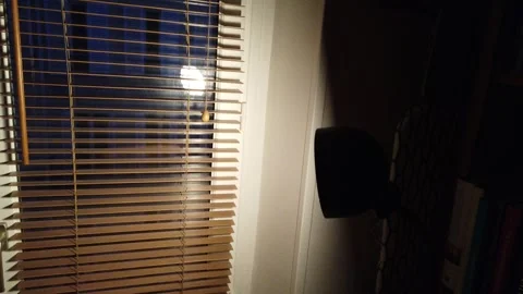 Hand held Shot inside an European House with American Blinds and a Lamp at Stock Footage 255195177