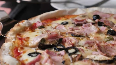 Hand held shot of Person taking one slice of pizza from take-out delivery pizza Stock-Footage 336586745