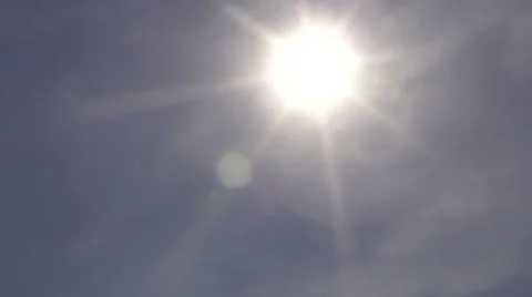 Hand Held shot of the sun with flares Stock Footage 43075668