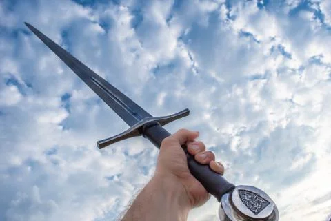 Hand held sword Stock Photos
