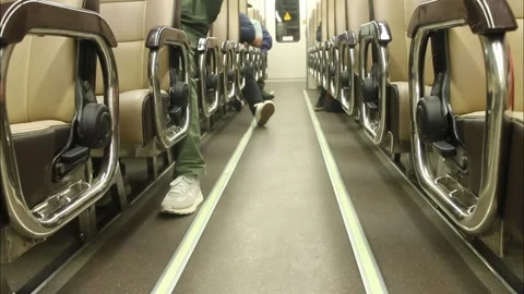 Hand held video of empty seat in a train corridor. Stock Footage 251699799