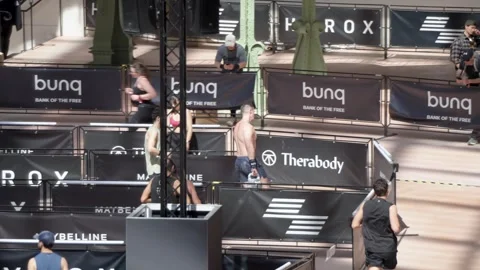 Hand Held View of Athletes and Spectators at Hyrox Fitness Competition Stock Footage 342290180