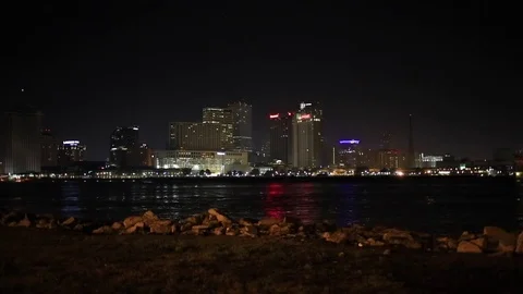 Hand held wide shot of New Orleans city skyline at night Stock-Footage 72715701