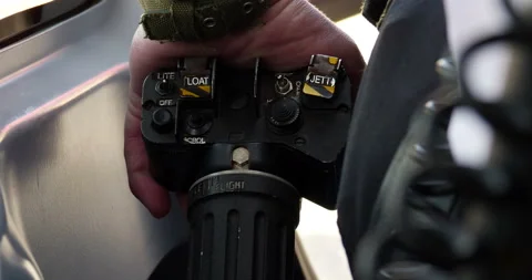 Hand on helicopter control during left off super close Stock Footage 153013596