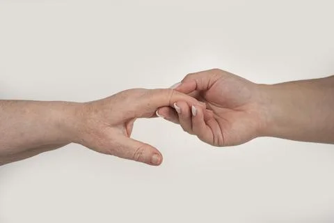 Hand help supports elderly. Hand help guides young. Hand help shares compassi Stock Photos