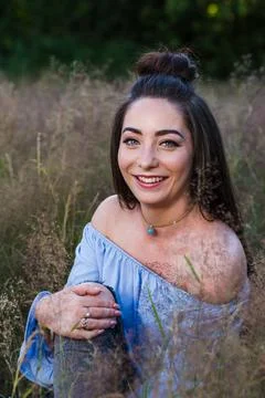 Hand on her knee Stock Photos