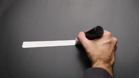 Hand highlighting on chalkboard with white marker Stock Footage 146393024