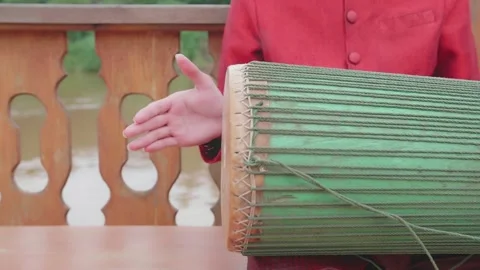 Hand Hit Drum To Make Lao Music Video stock 344312202