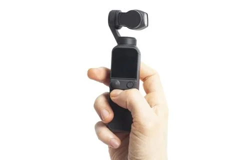 Hand hold action camera isolated on white background 스톡 사진