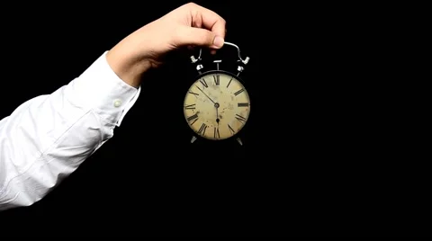 Hand hold alarm clock to keep on a palm. Time lapse Stock Footage 61566291