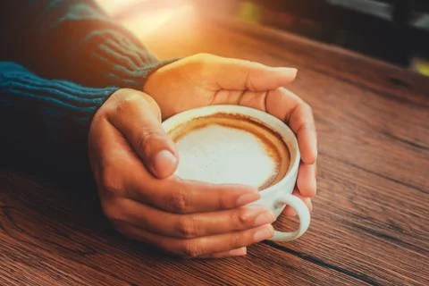 Hand hold coffee cup Stock Photos